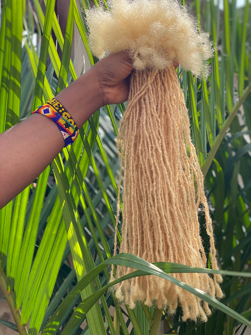 Extra Small Loc extensions. 300 locs per bundle. 100% Afro Kinky Human Hair Dreadlocks Extensions.